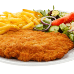 Schnitzel mit pommes salat removebg preview
